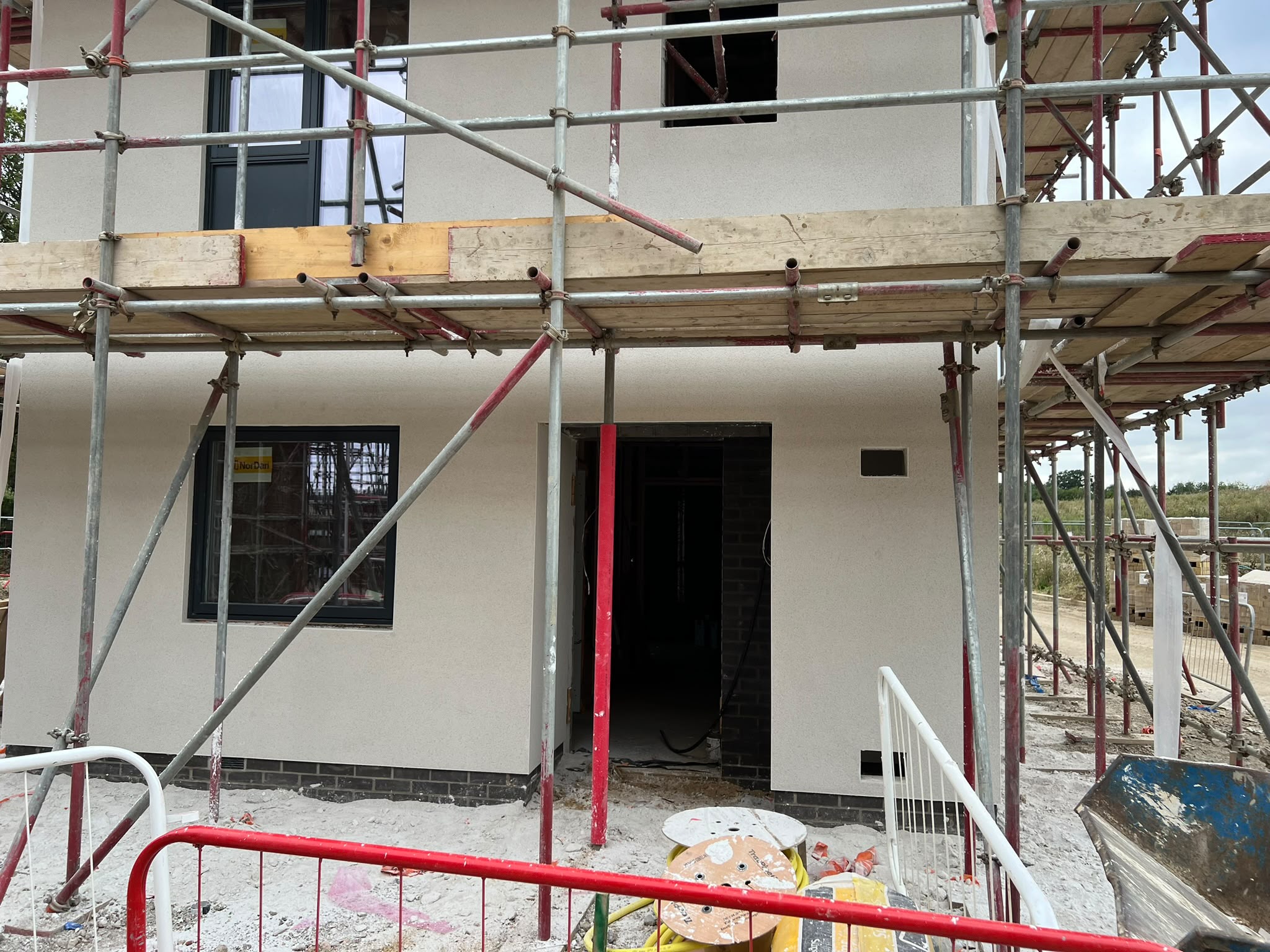 Side elevation of new-build with monocouche through-coloured finish
